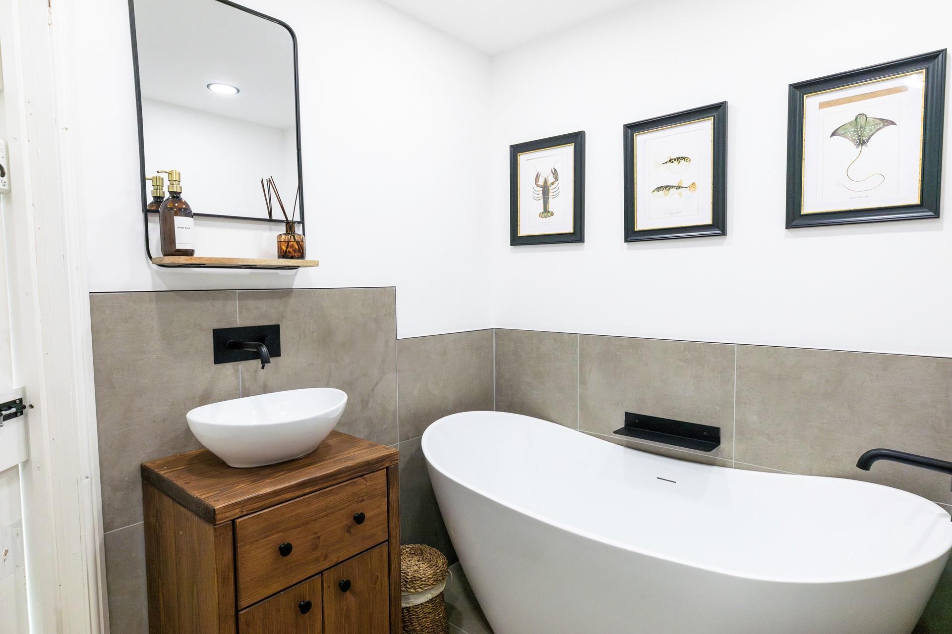 Sink into the luxurious bathtub at the end of the day.