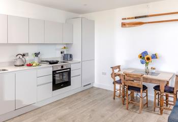 Cook up a feast in the fully equipped modern kitchen.