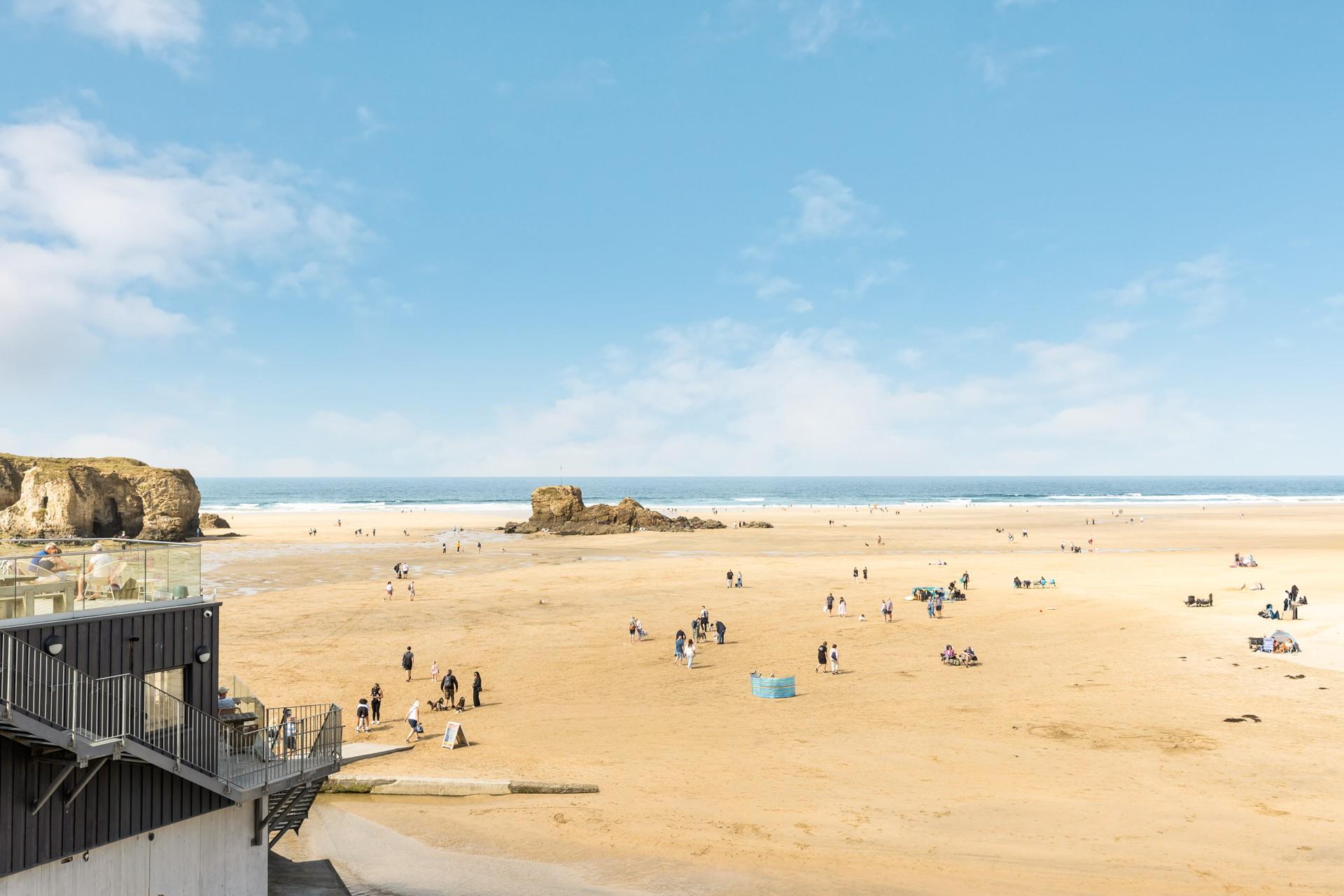 The far-reaching view stretches across the sand and out to Chapel Rock, home to a natural sea pool at low tide!
