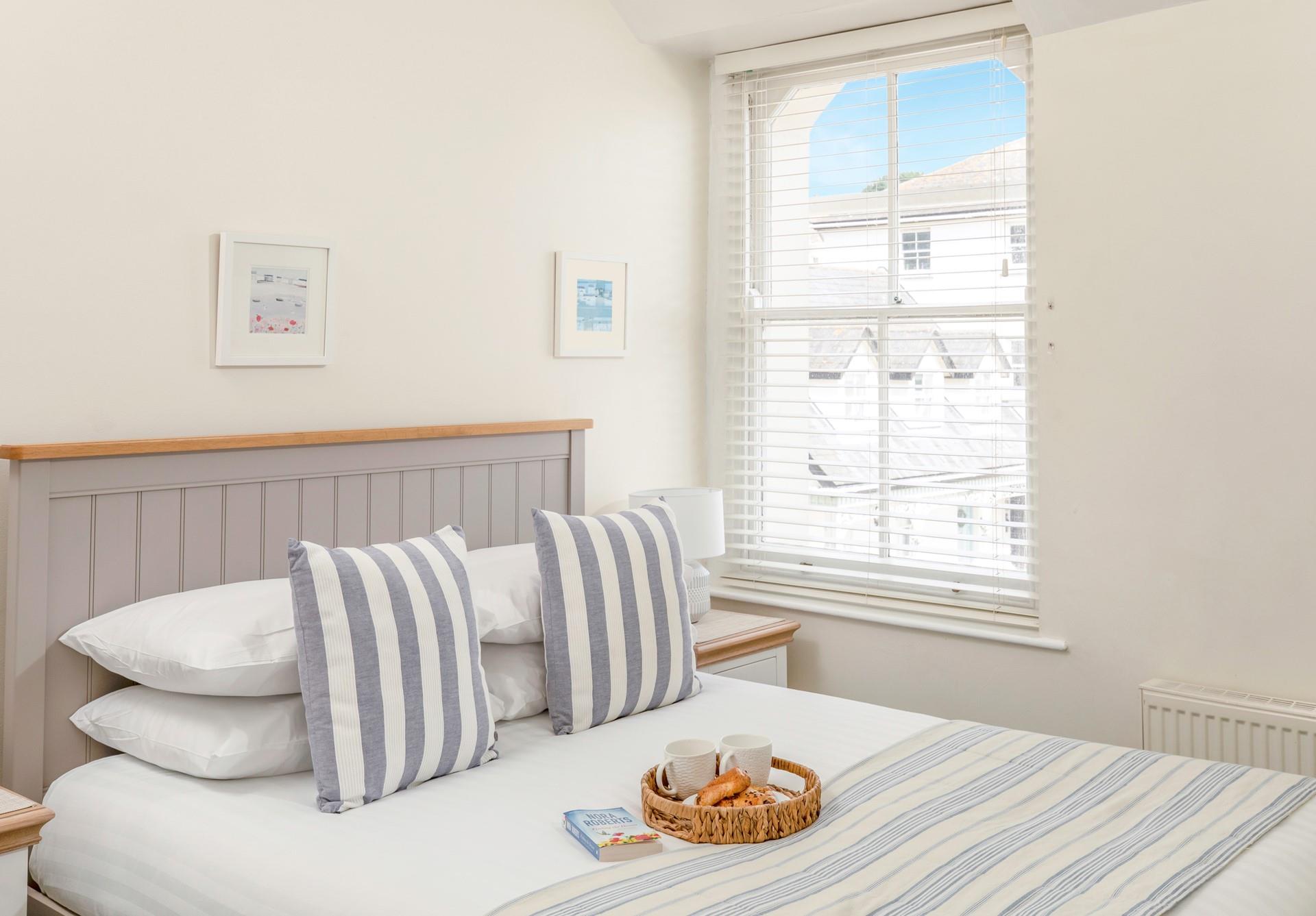 Wake from a relaxing night's slumber in the double bedroom.