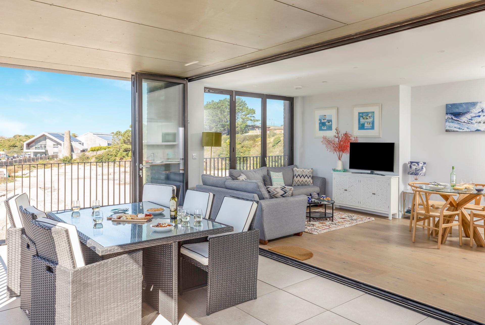 Take nibbles and drinks out onto the terrace and enjoy the view.