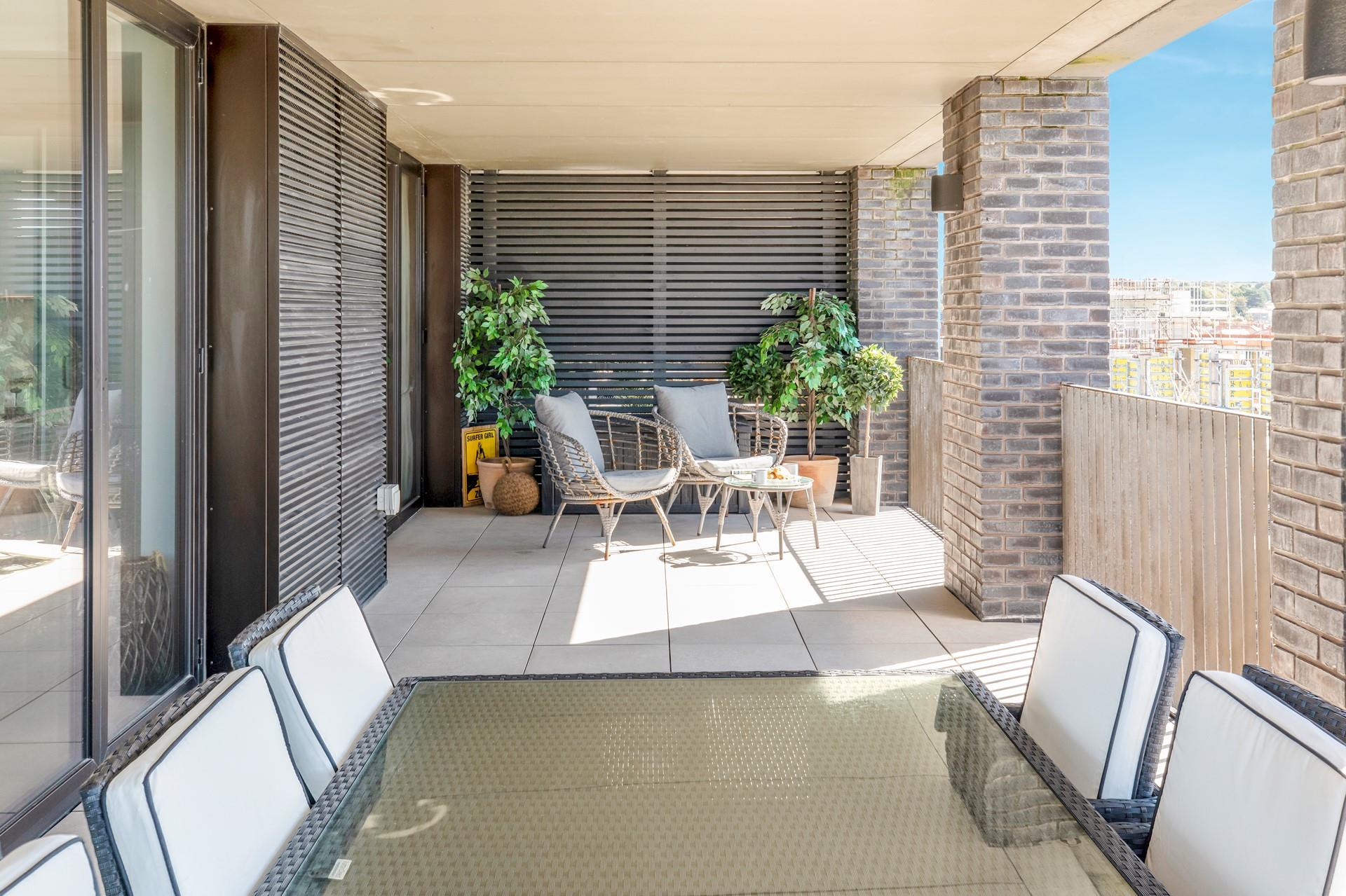 The sitting room and bedroom lead onto the sea view terrace.