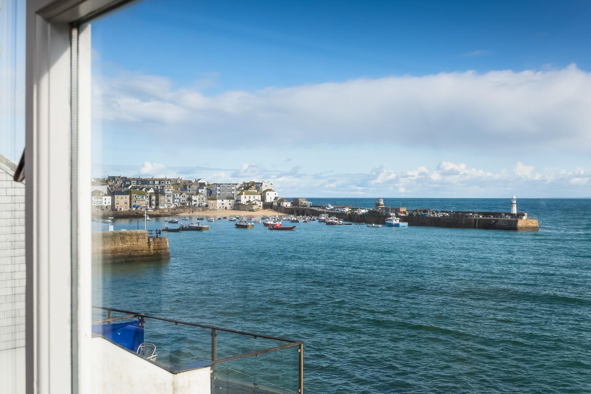 Gaze out of the window at St Ives harbour.