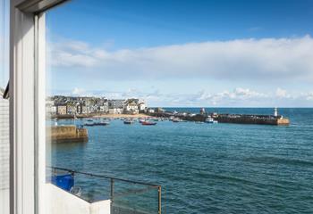 Gaze out of the window at St Ives harbour.