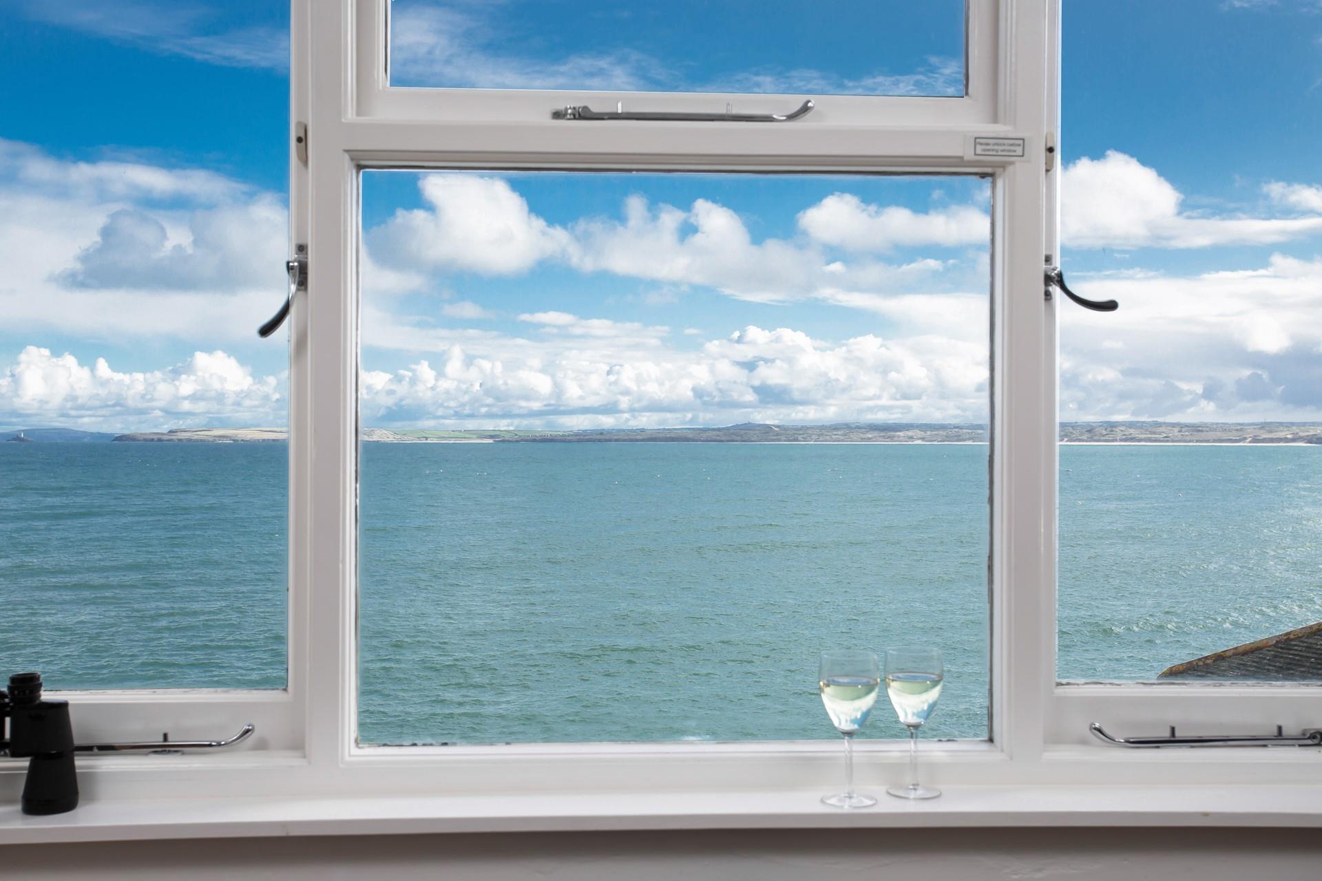 Gaze out of the window at St Ives harbour.