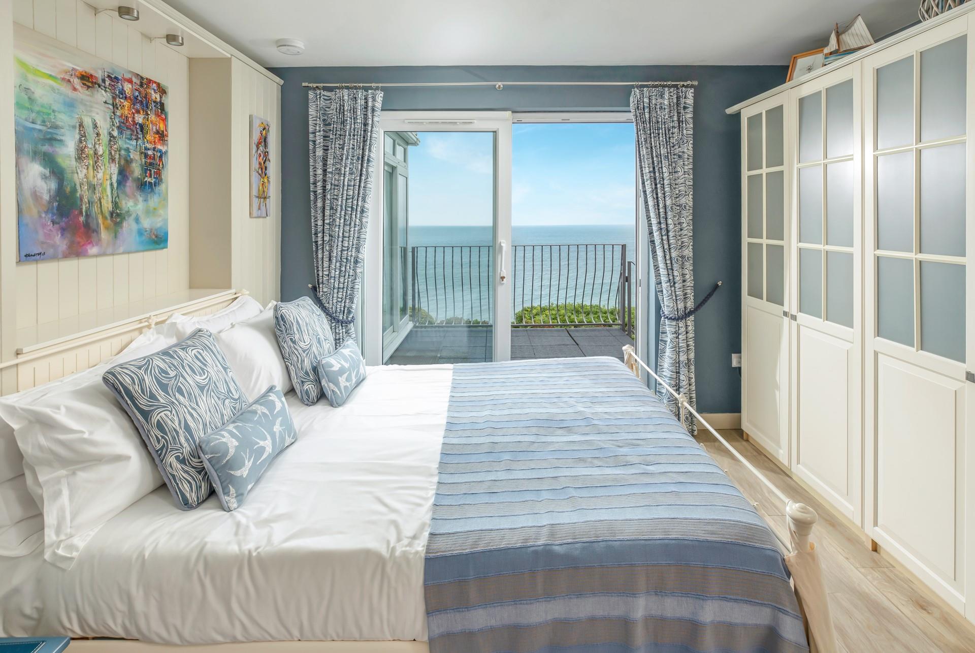 Wake up in the king-size bed to beautiful sea views.