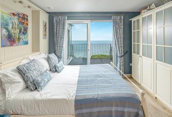 Wake up in the king-size bed to beautiful sea views.