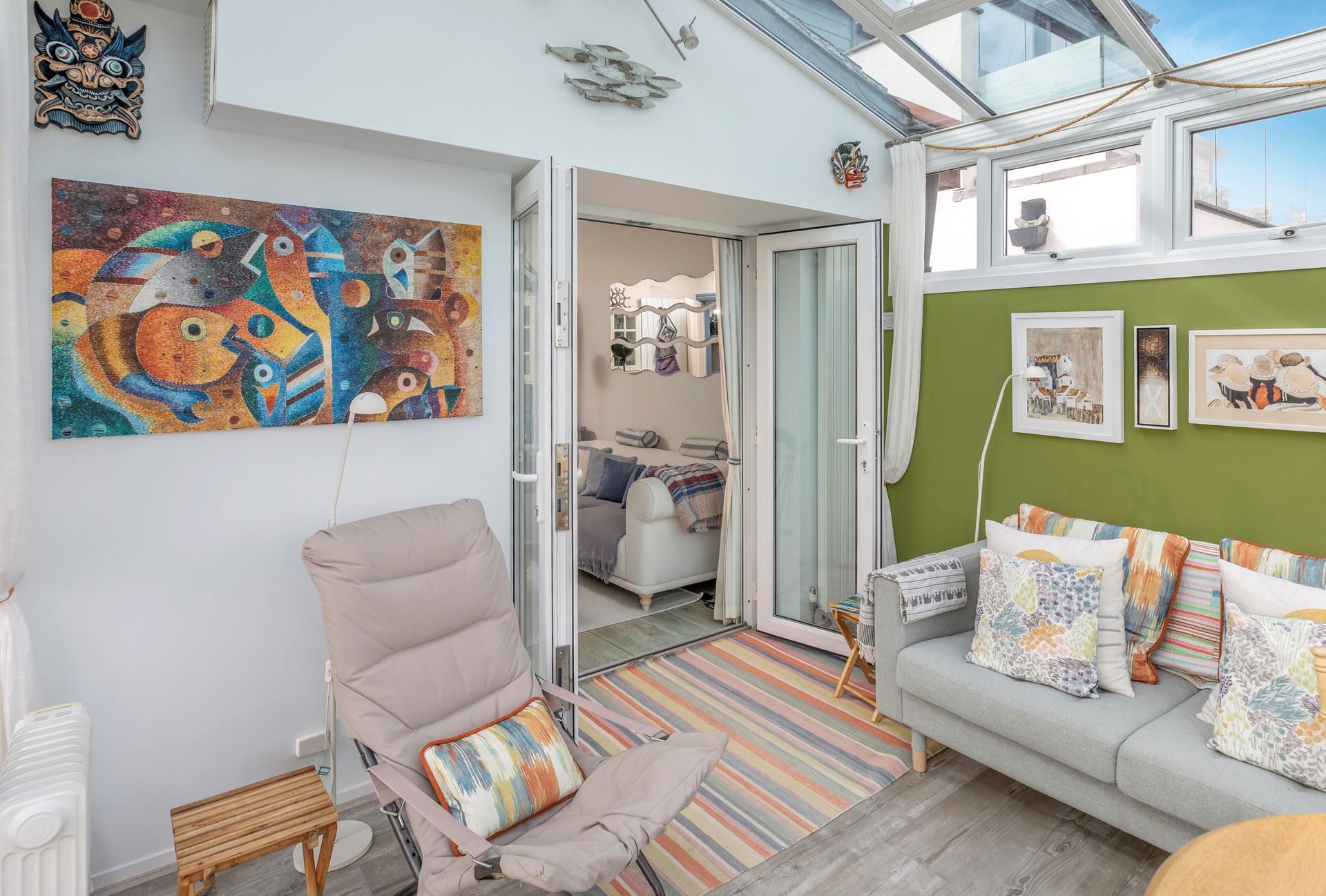 The conservatory has unbeatable views across St Ives Bay.