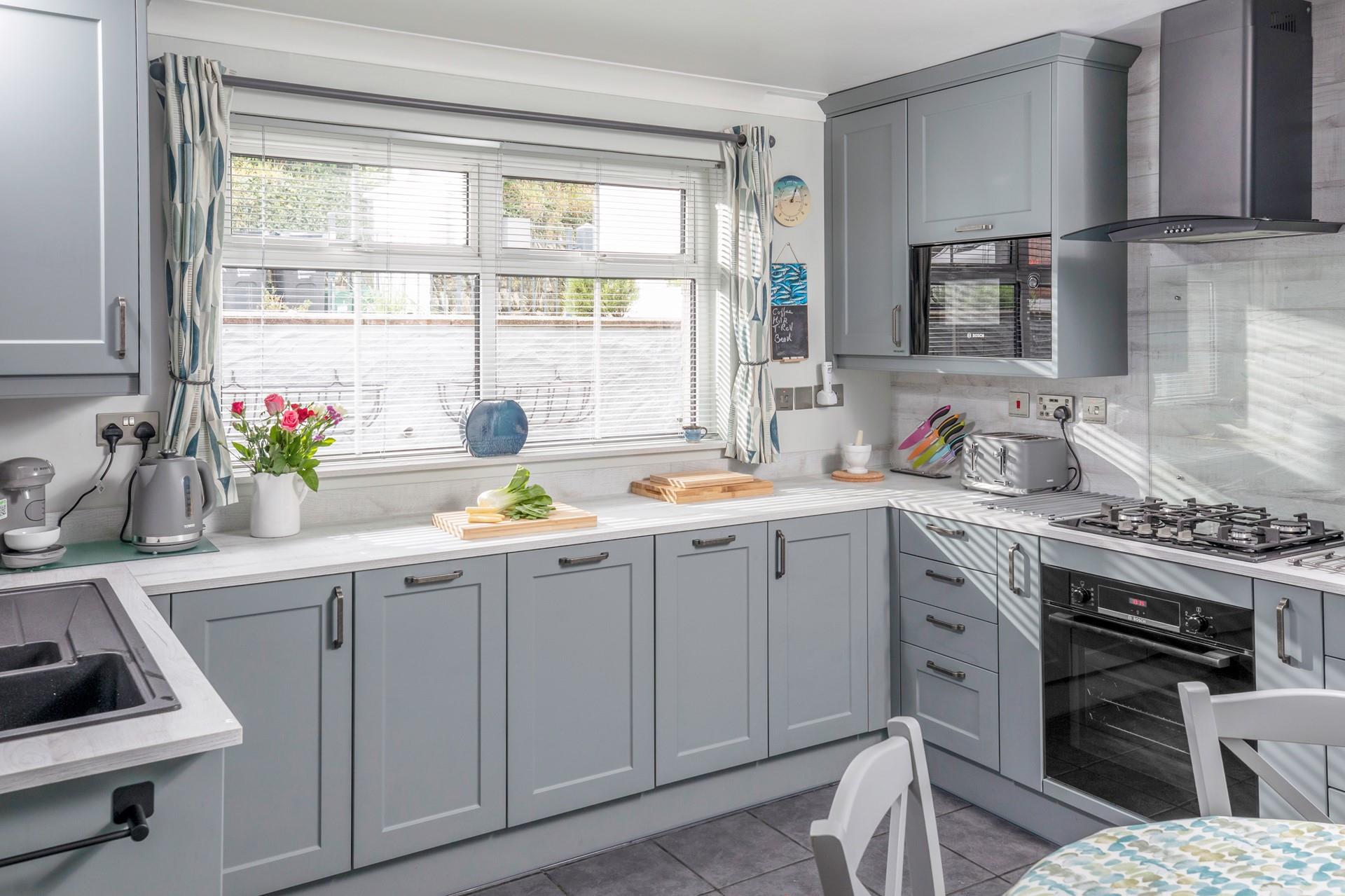 The kitchen is modern and well-equipped for cooking tasty meals. 