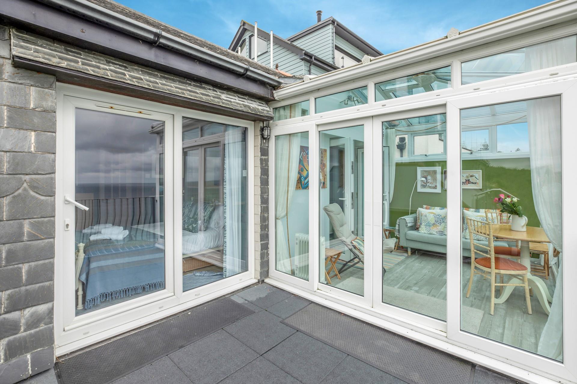 Take a morning cuppa outside to enjoy the sunshine and sea views.