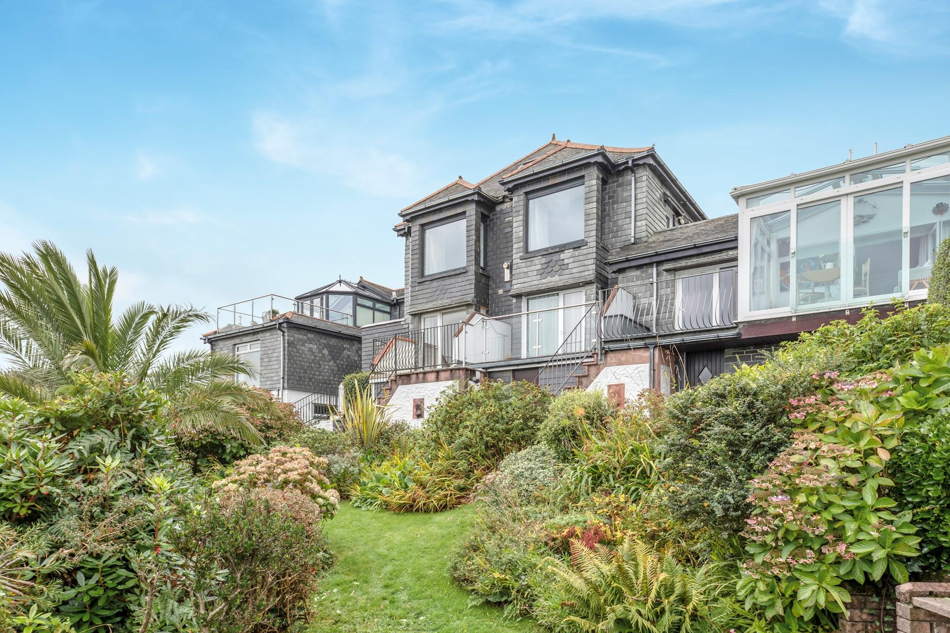 Take the South West Coast Path and walk into to St Ives.