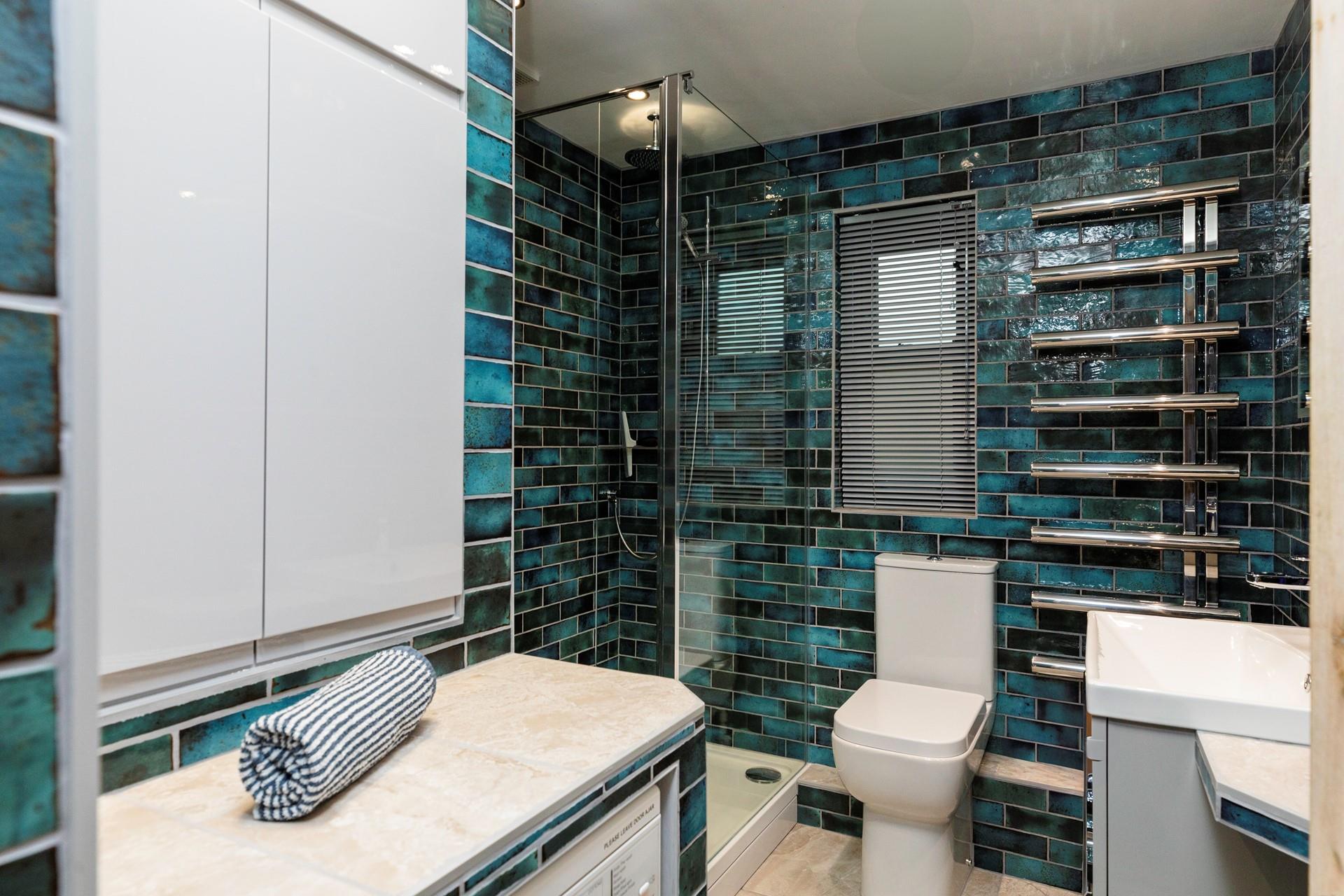 Step into the stunning contemporary shower room.