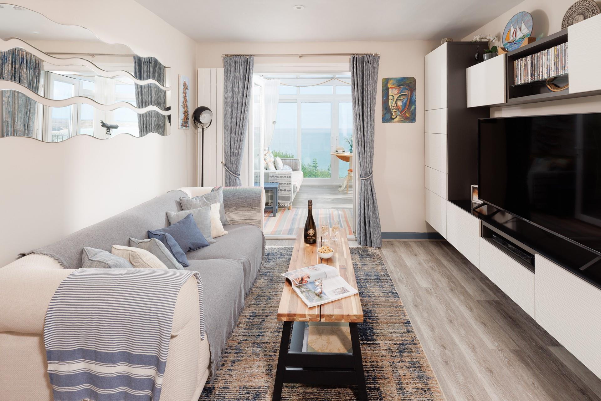 With magnificent sea views from the sitting area and conservatory.