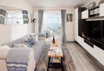 With magnificent sea views from the sitting area and conservatory.