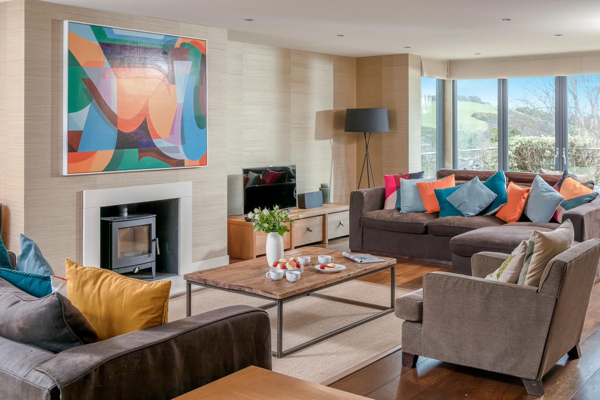 Local artist Kleiner Shames' work features in the living room.