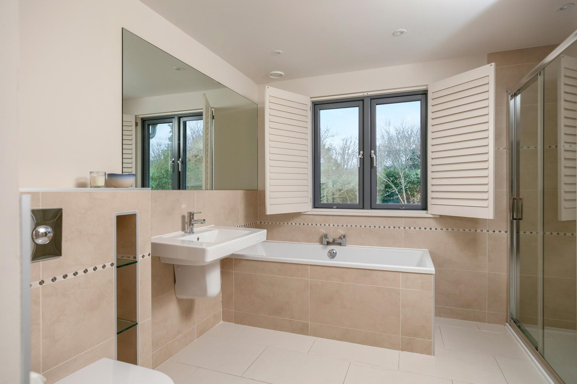 The large family bathroom is ideal for getting ready each morning.