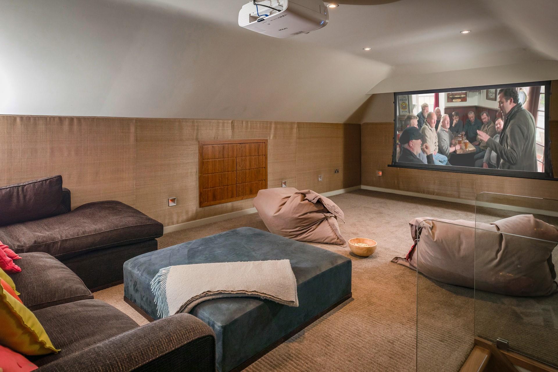 Upstairs you will find the cinema room! Perfect for nights in.