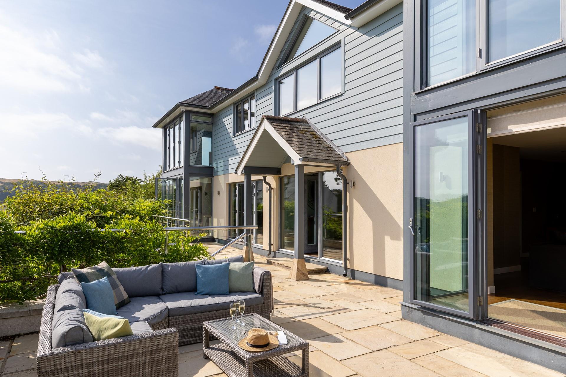 From the kitchen diner across to the lounge, the front terrace spans the width of the property.