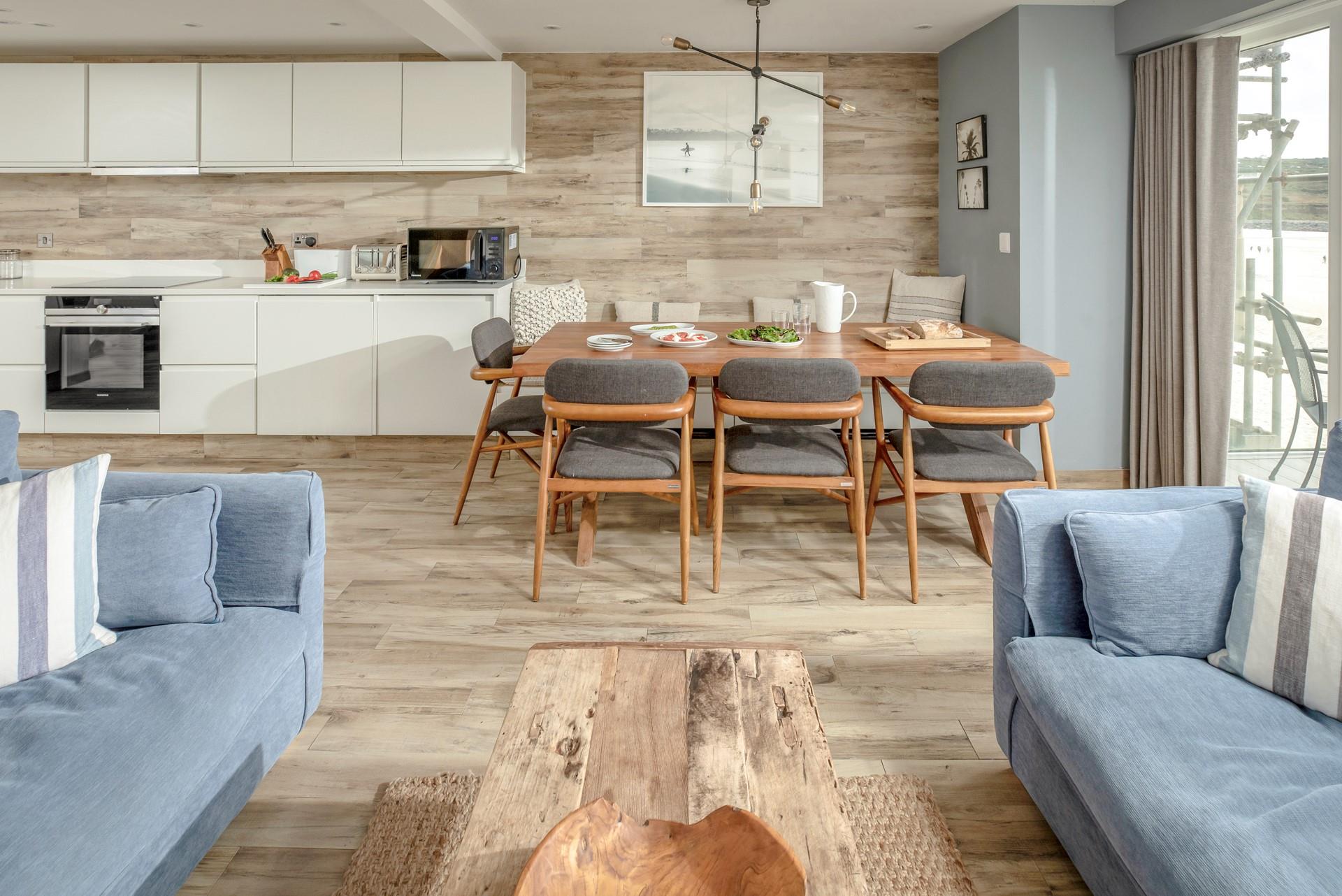 Tuck into a tasty meal as the sun goes down over Porthmeor.