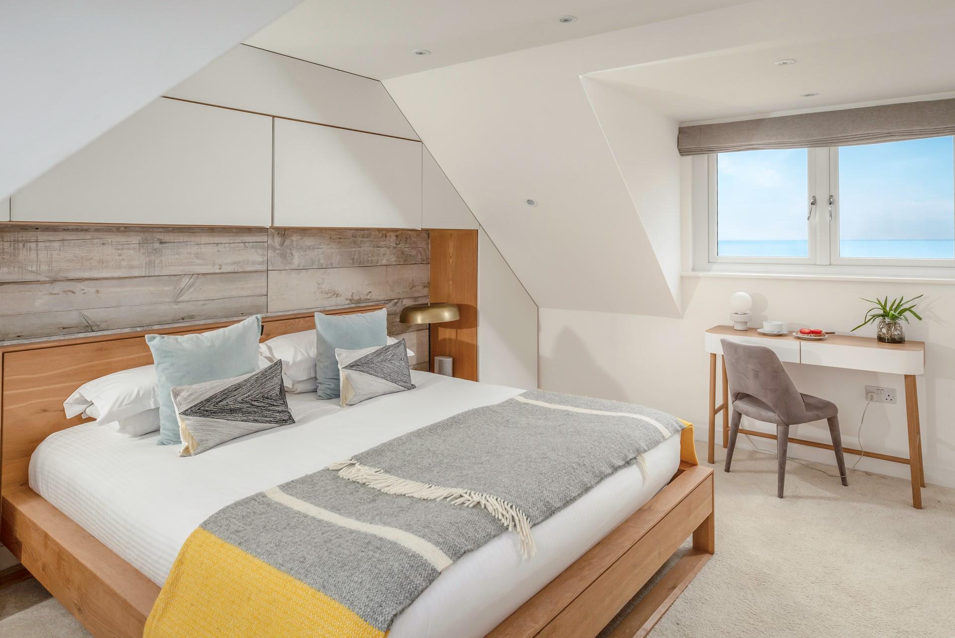 The luxurious king size bed offers a sumptuous night's sleep.