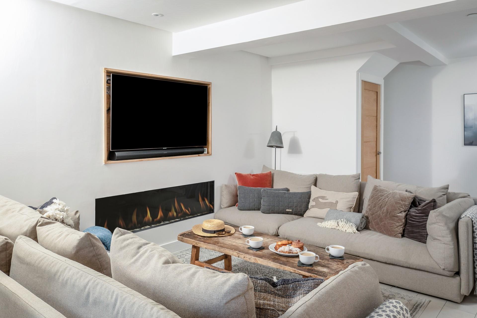 Enjoy the ambient flicker of the fire in the second sitting room.