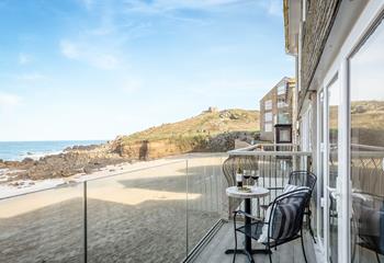 Take drinks and nibbles onto the balcony and enjoy the sea views.