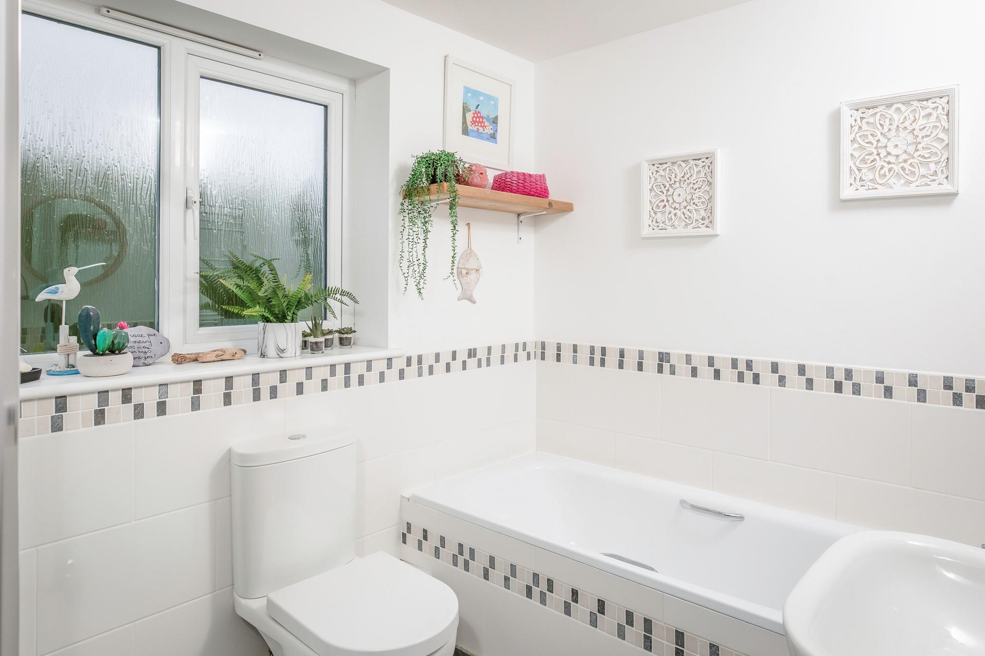 Get ready for the day in the family bathroom.