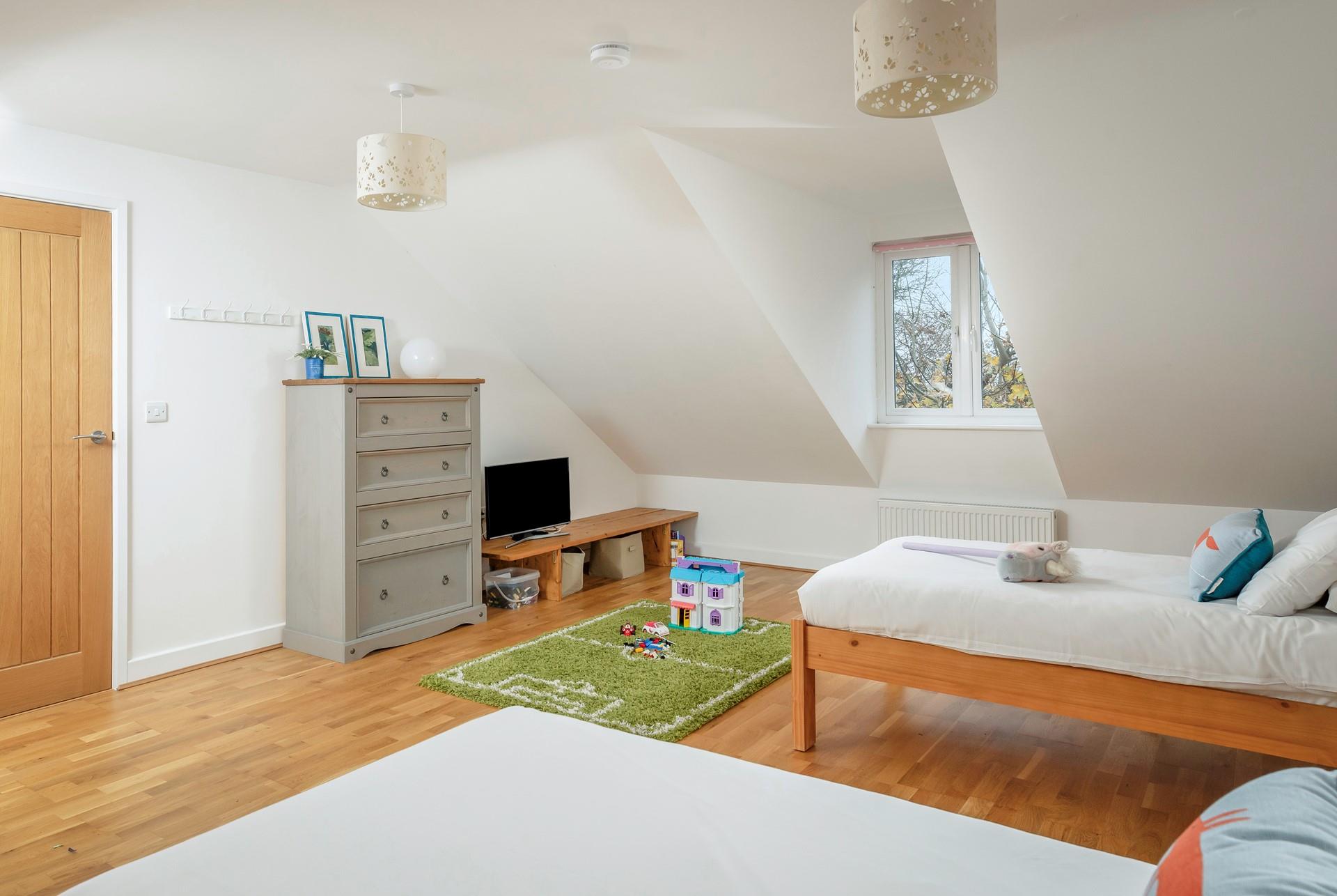 Relax and unwind in the cosy bedroom.