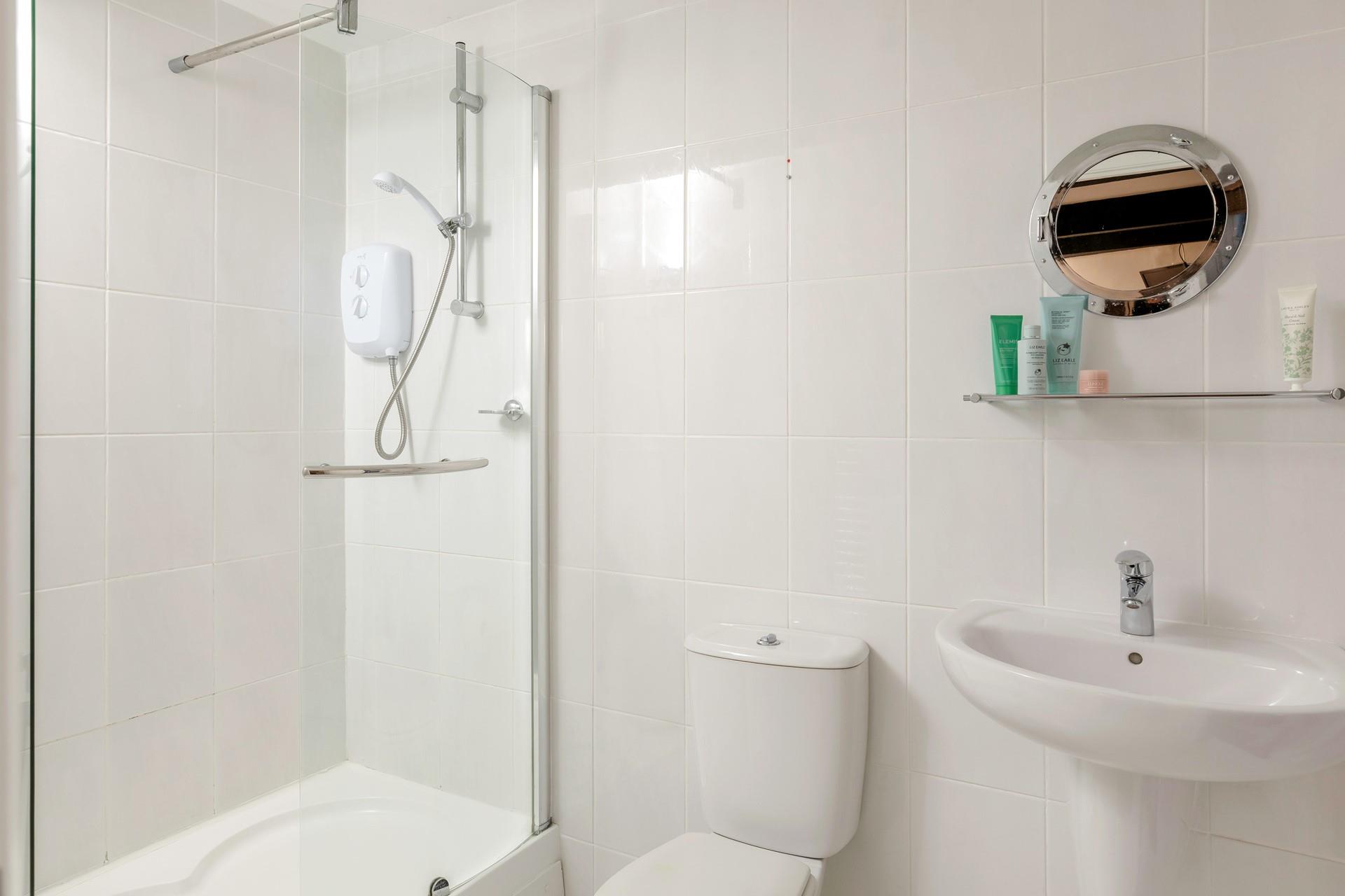 The family bathroom boasts a shower over bath, so you can enjoy a long soak or quick rinse!