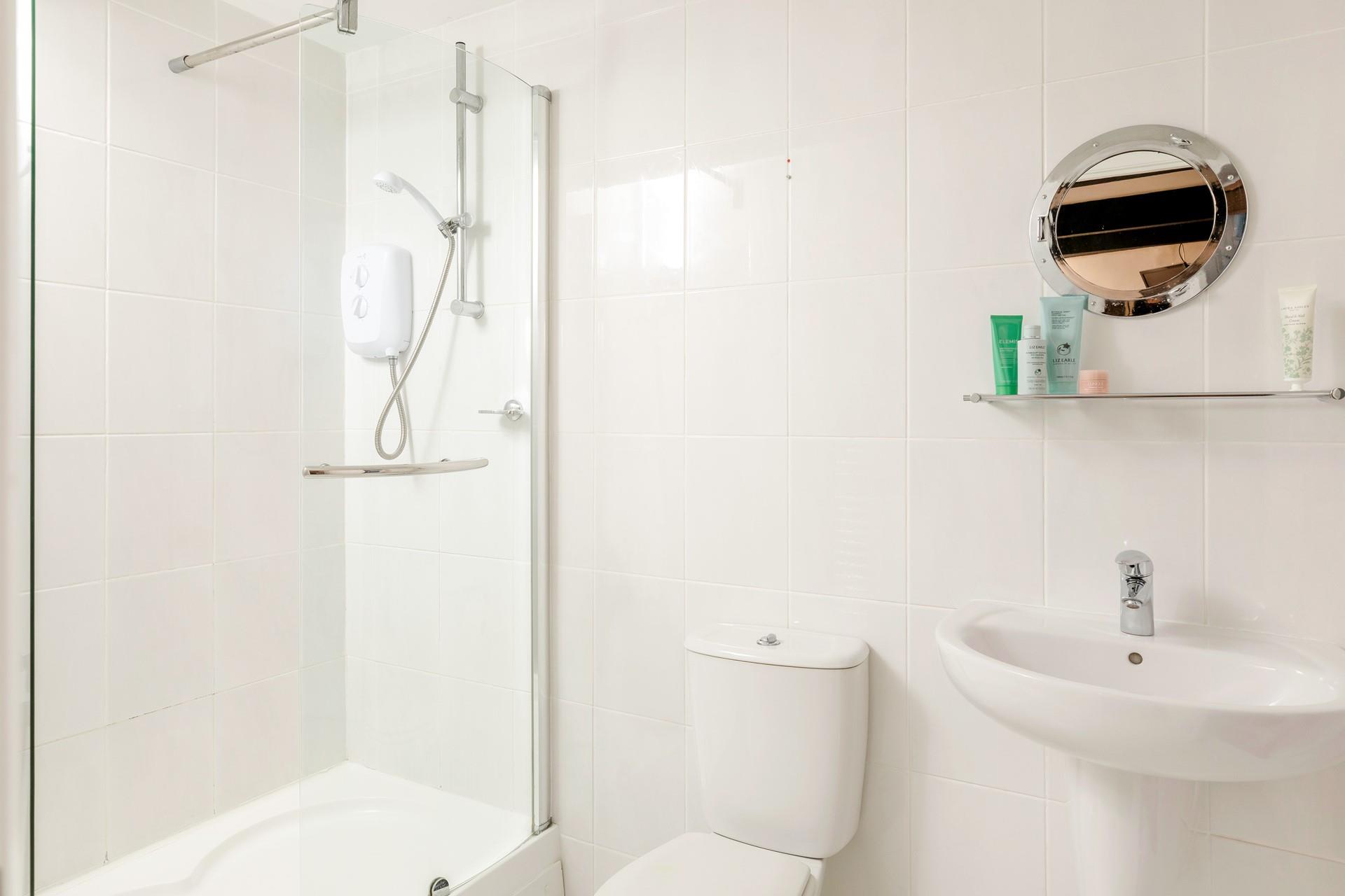 The family bathroom boasts a shower over bath, so you can enjoy a long soak or quick rinse!