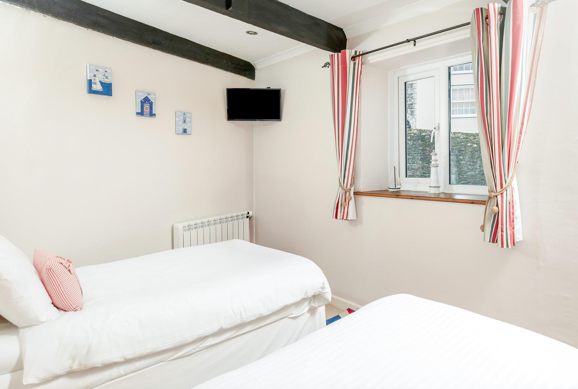 The twin bedroom lends itself to both children and adults alike!