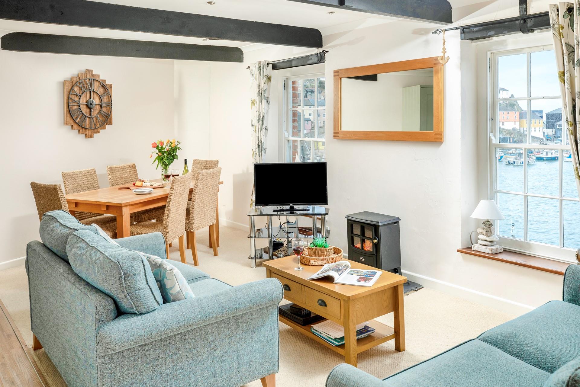 Enjoy stunning harbour views at The Sail Loft in Mevagissey.