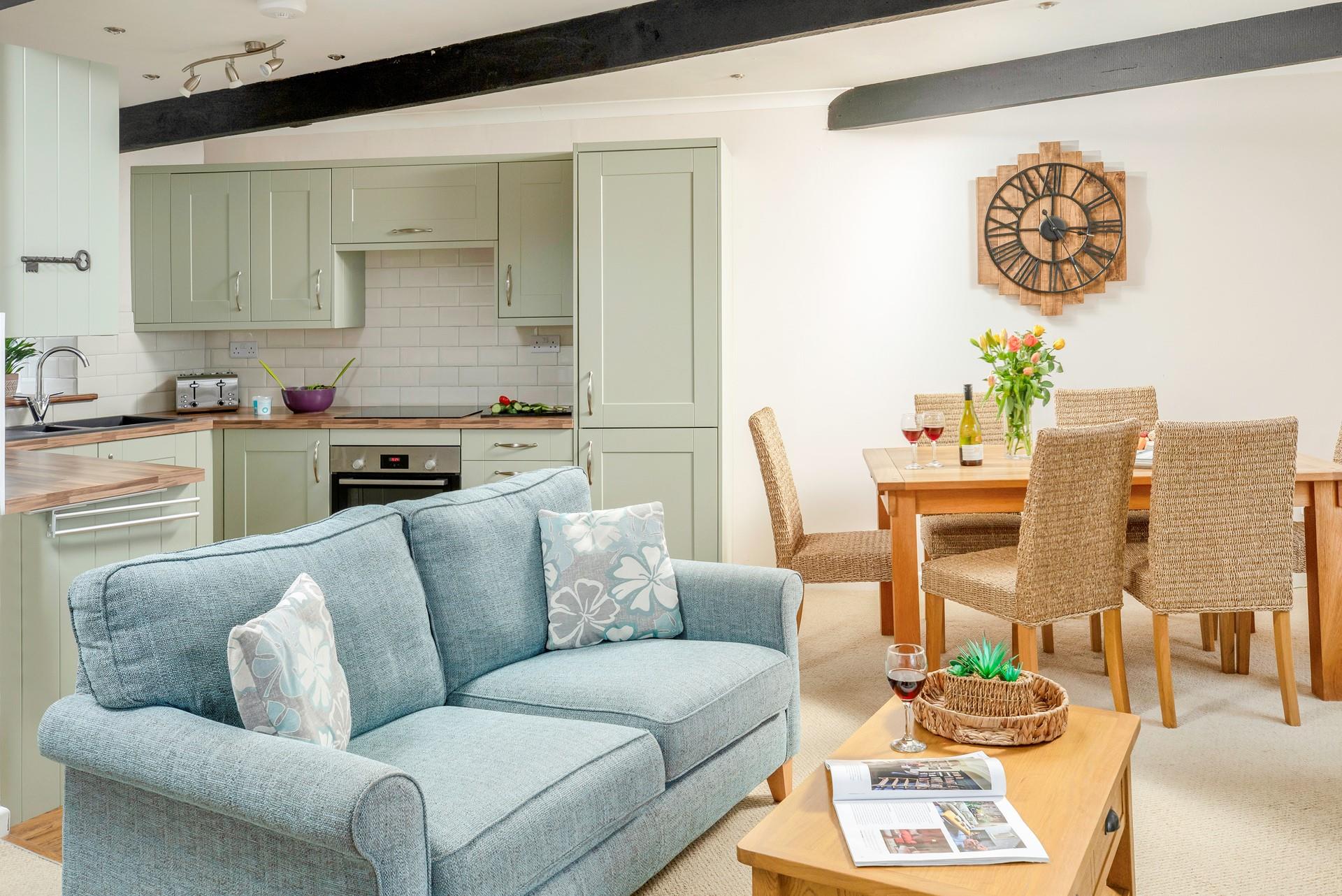 Spend time together, cooking, eating, and relaxing in the stylish living space.