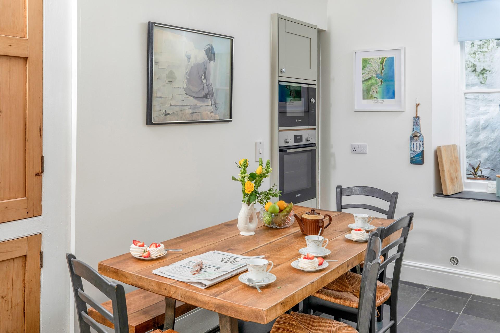 Tuck into a cup of tea and dessert at the dining table.