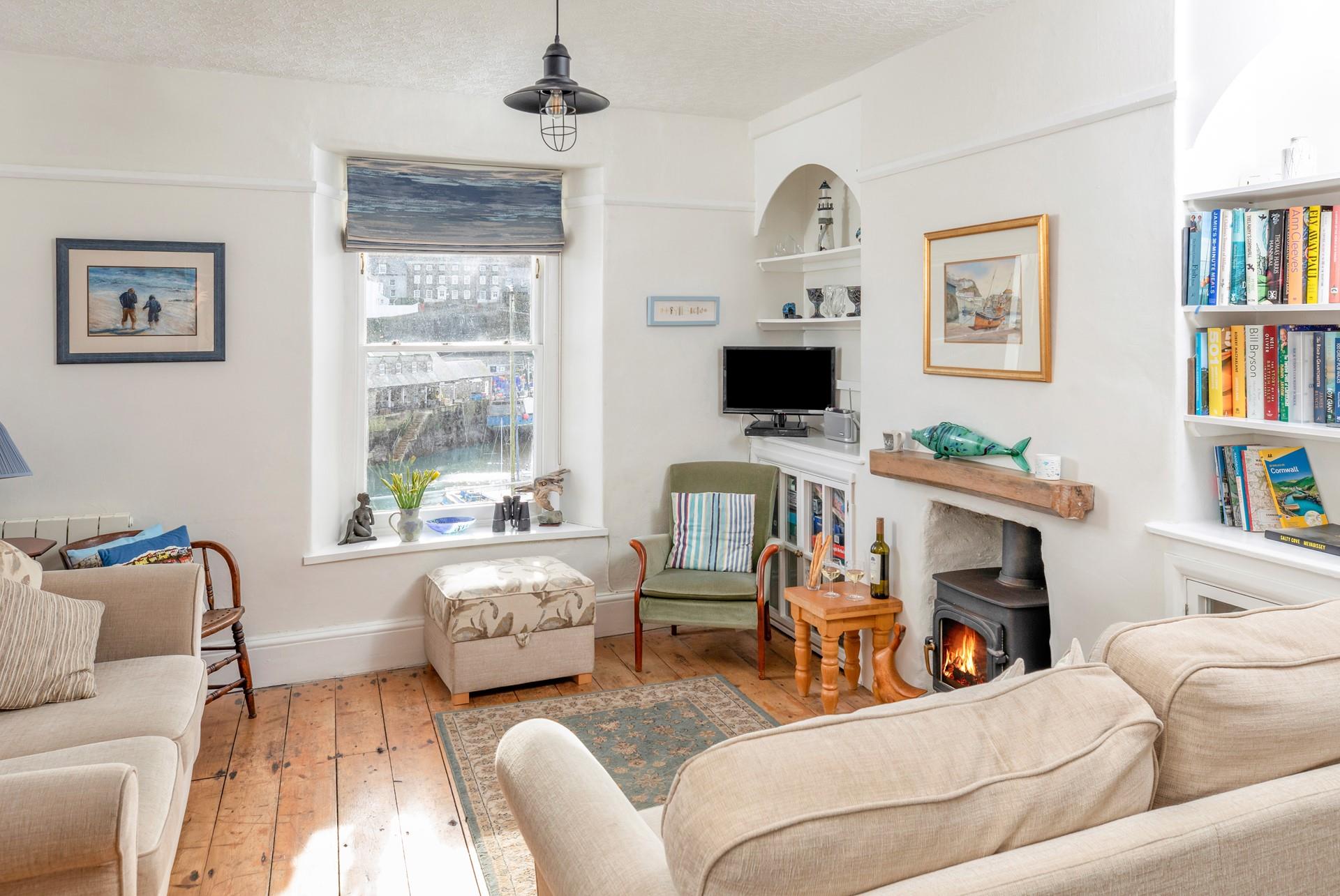 Snuggle up in front of the woodburner in this cosy cottage.