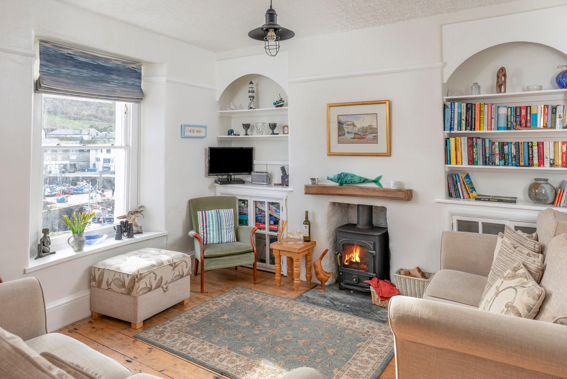 The sitting room has gorgeous harbour views.