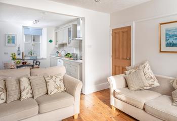 The open-plan kitchen and dining area are modern and spacious.