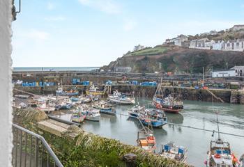 The idyllic harbour is just steps from the door.