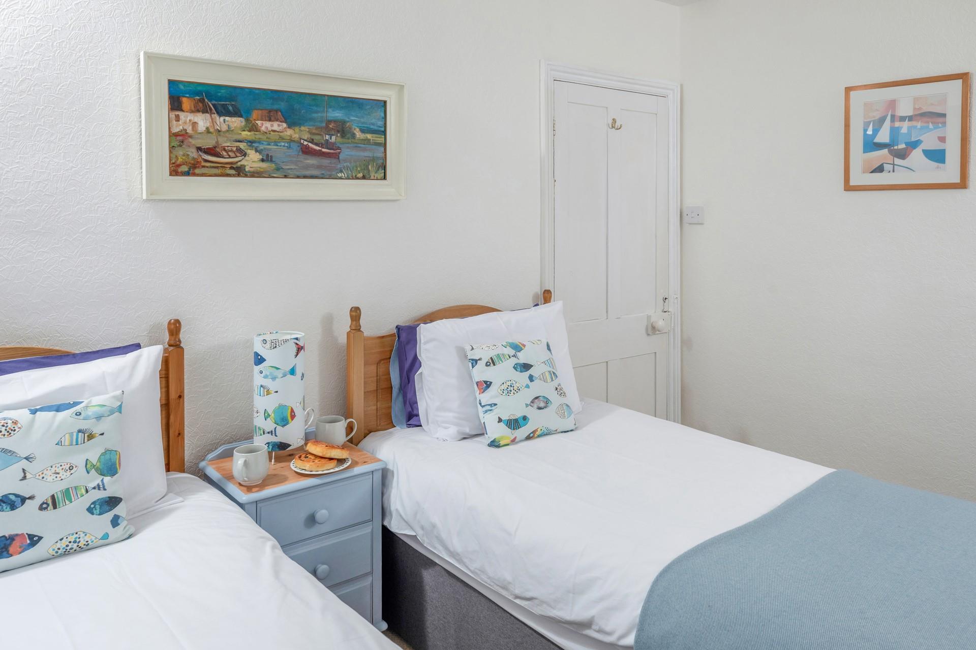 The twin beds are ideal for additional guests.