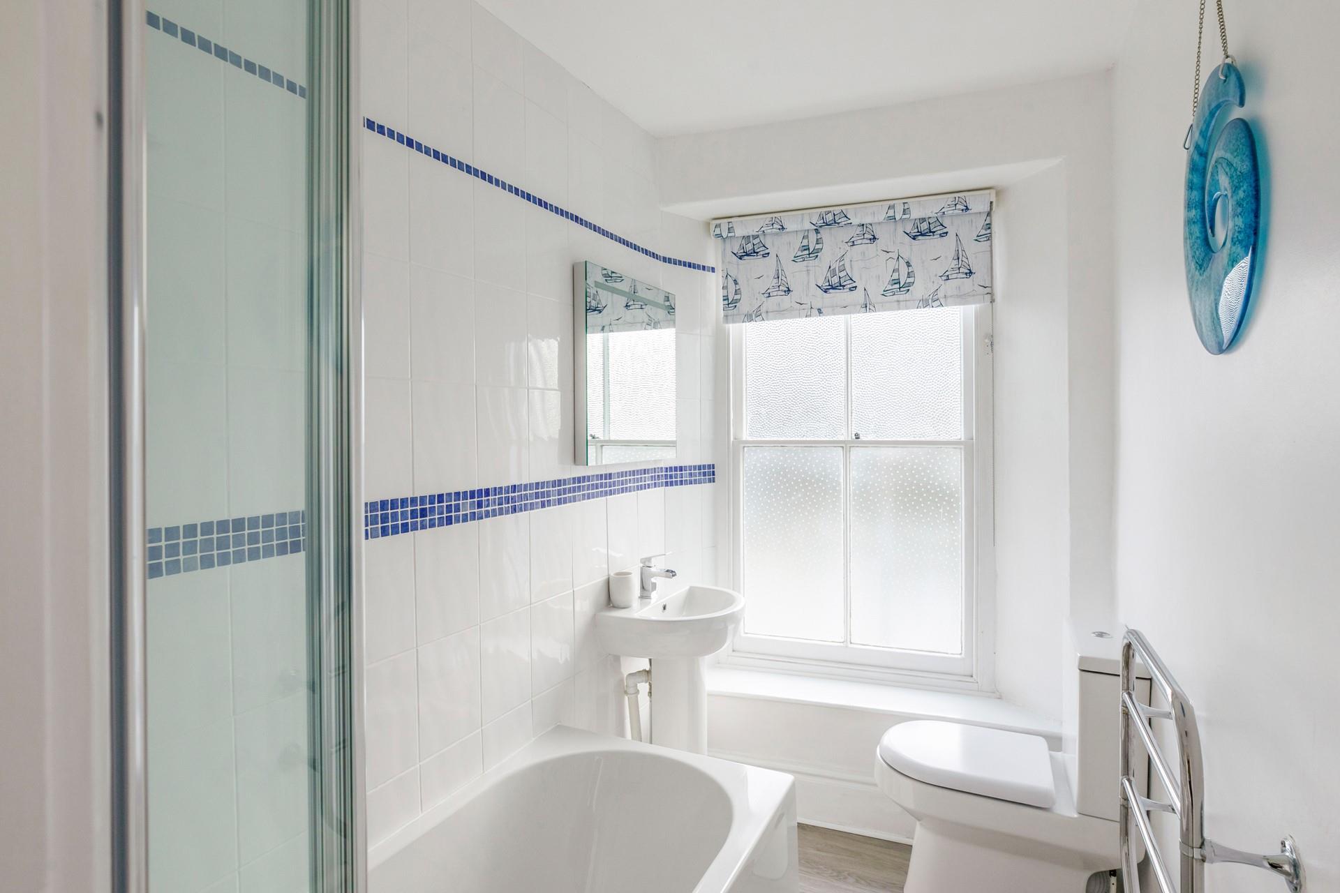 The family bathroom is ideal for getting ready each day.