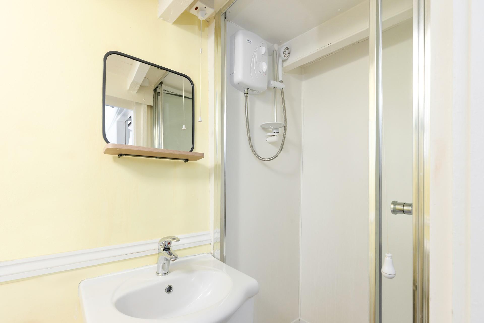 Wash off sandy toes in the shower room.