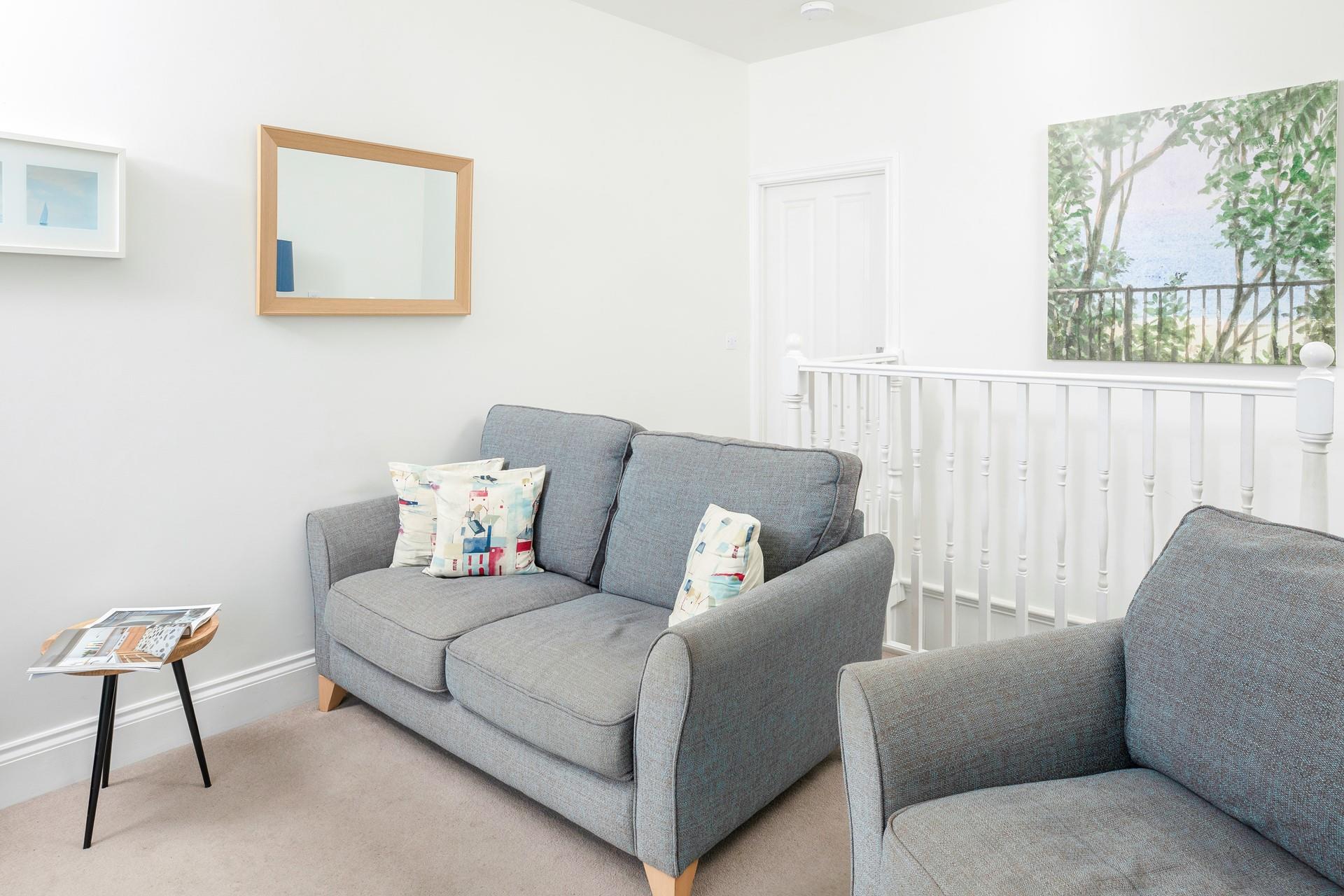 The cosy sofas are ideal for relaxing after a walk along the coast.