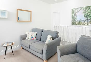 The cosy sofas are ideal for relaxing after a walk along the coast.