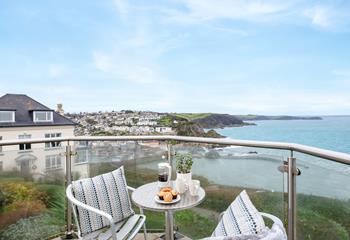 Dine al fresco, taking in the magnificent coastal view.