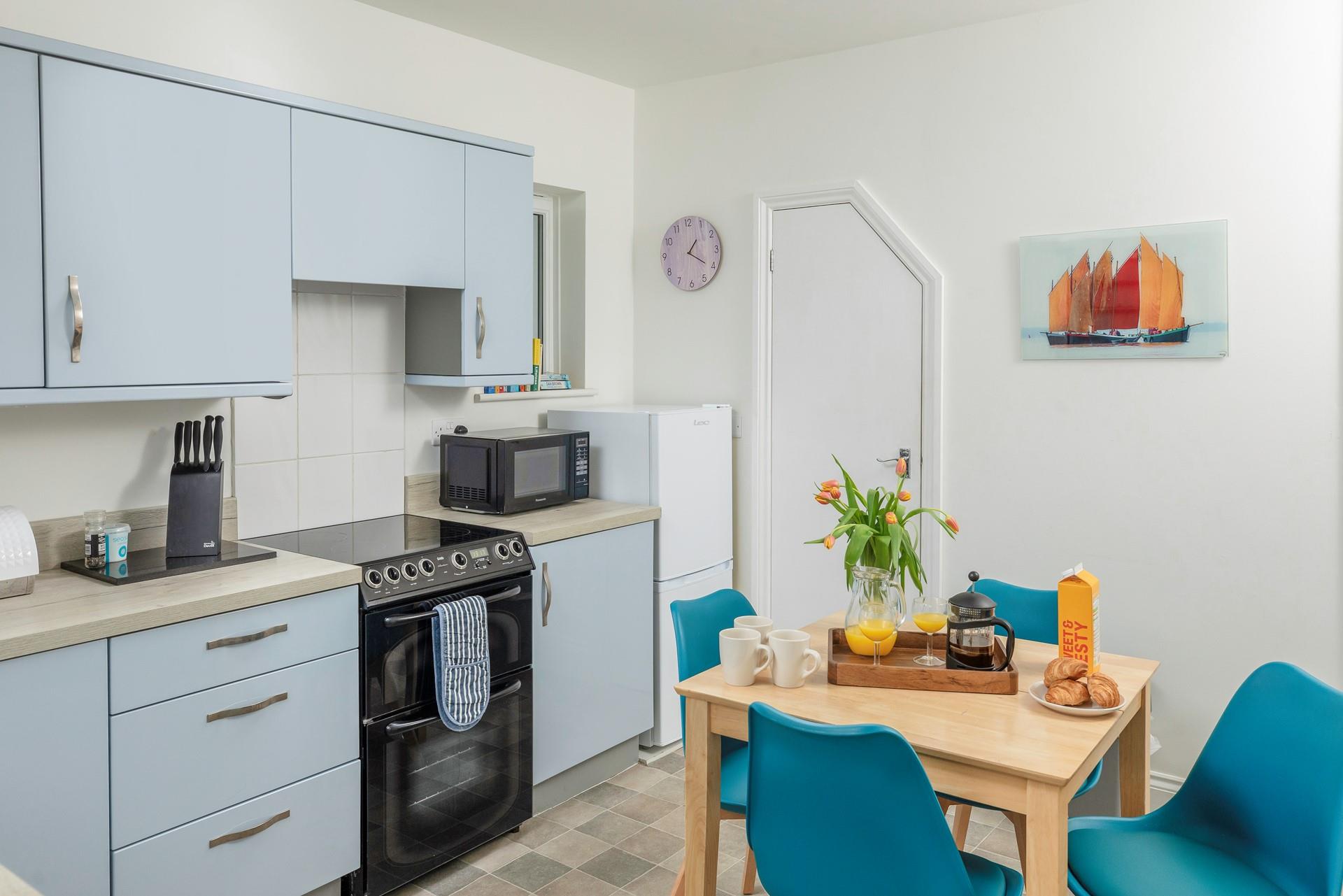 There's a handy dining table, perfect for breakfast before you head out to explore.