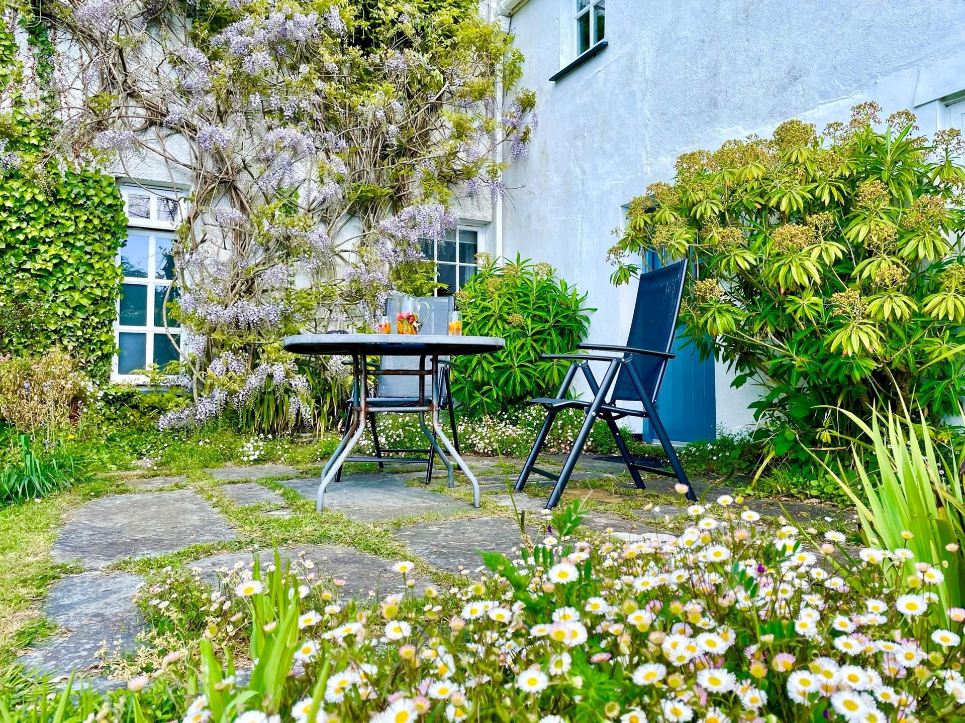 Make the most of sunny days in the pretty courtyard.