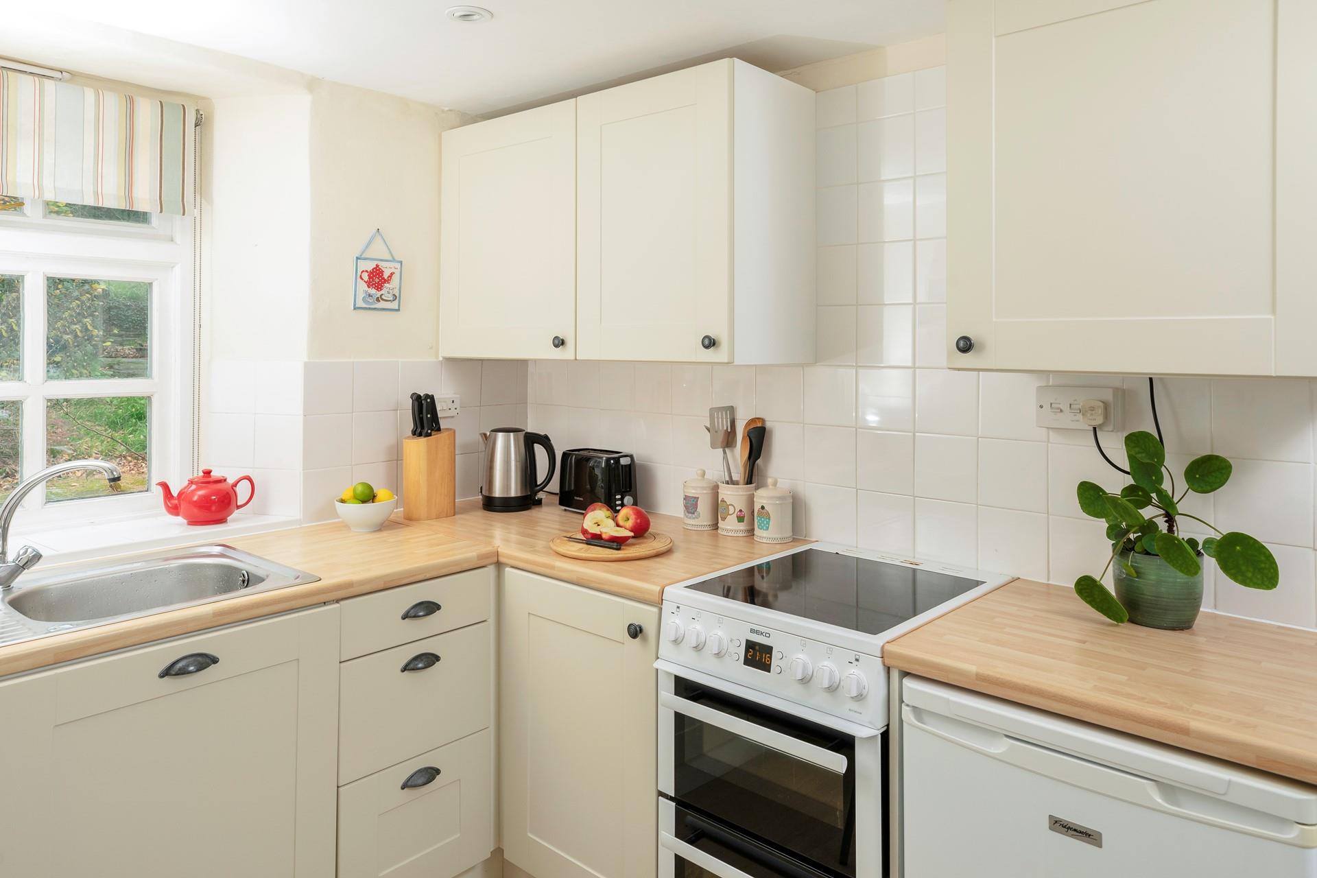 The kitchen is well-equipped with everything you need to cook and dine together.