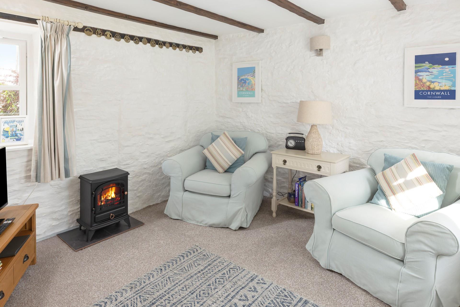 The quaint cottage has a delightful blend of traditional features and cosy amenities.