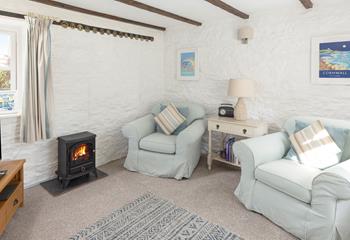 The quaint cottage has a delightful blend of traditional features and cosy amenities.