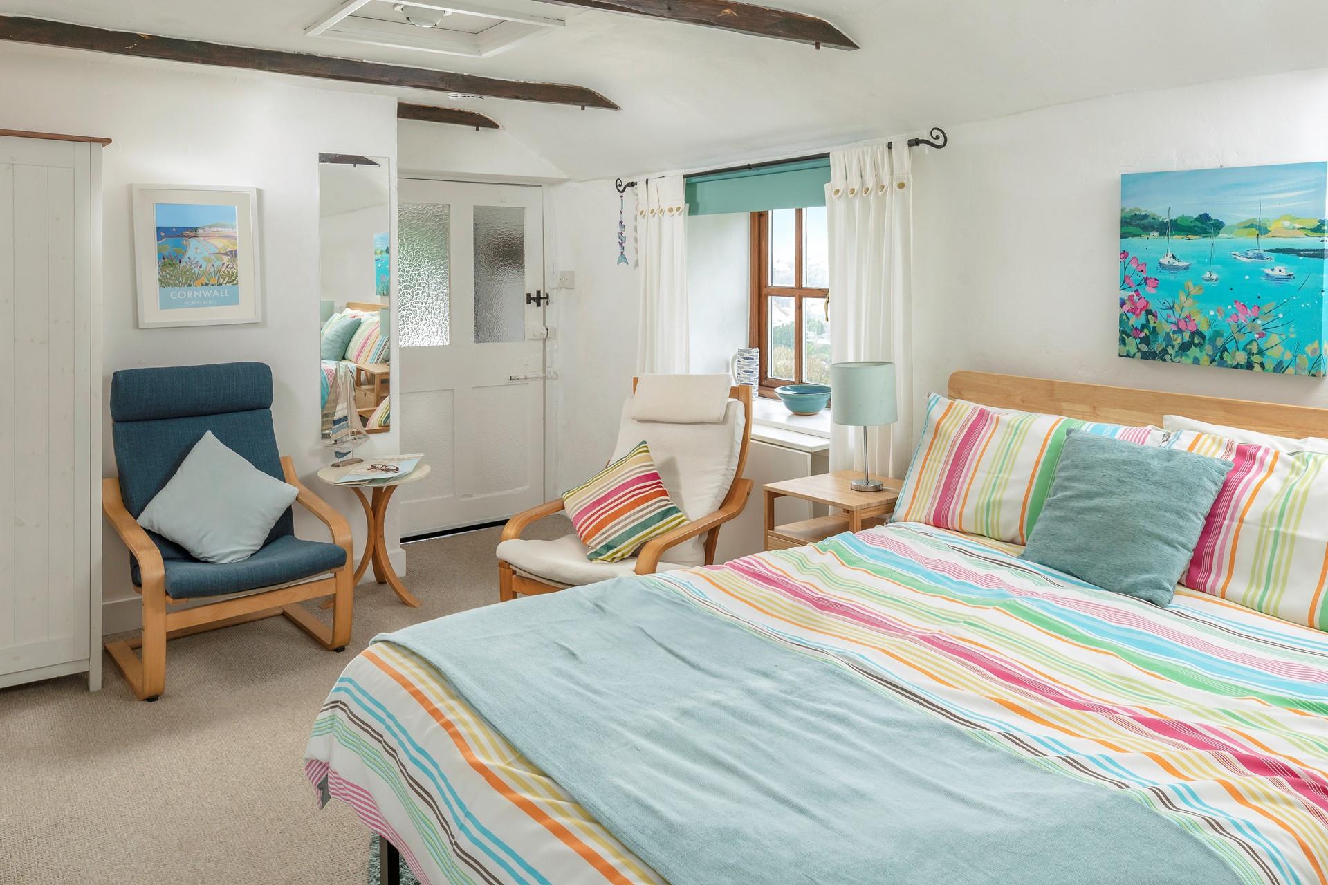 Colourful decor reflects the pretty coastal location.